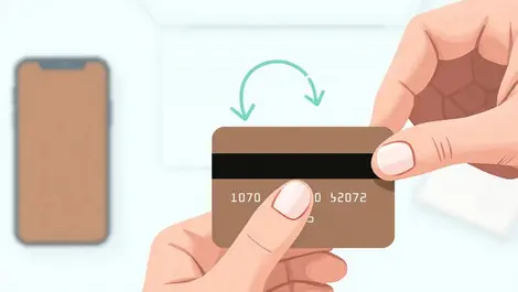 Hand holding credit card recurring arrow loop smartphone laptop online payments